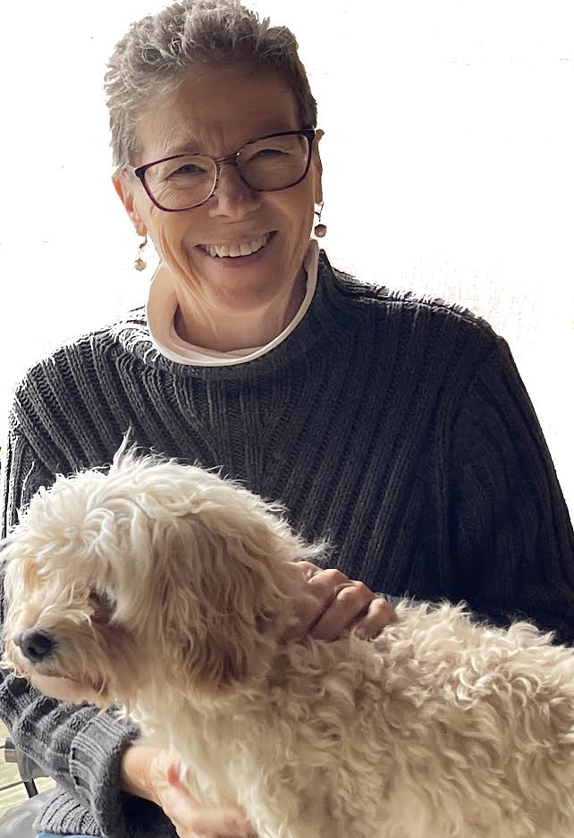 The Paradigm Shifts Counseling Dr. Rosie Kuhn with Small Dog
